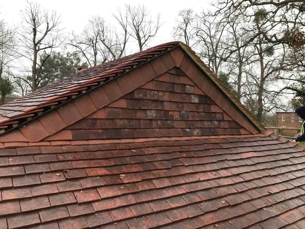 This is a photo of a tiled roof apex installed in Ashford Kent. All works carried out by Ashford Roofing Services based in KENT